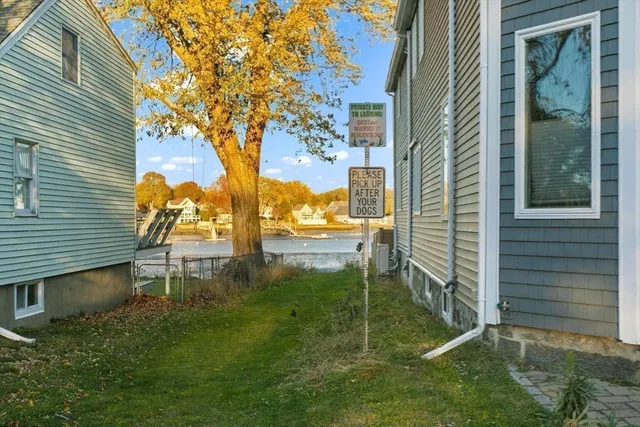 a picture of floor with a white wall and a painting