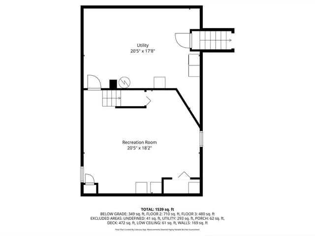 a picture of a bench in front of a wall