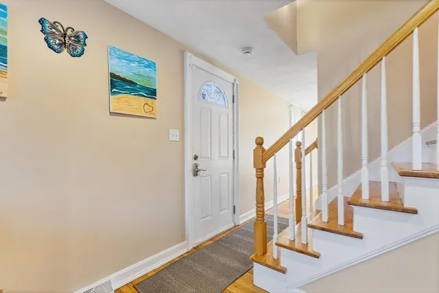 a kitchen with granite countertop a sink and a window
