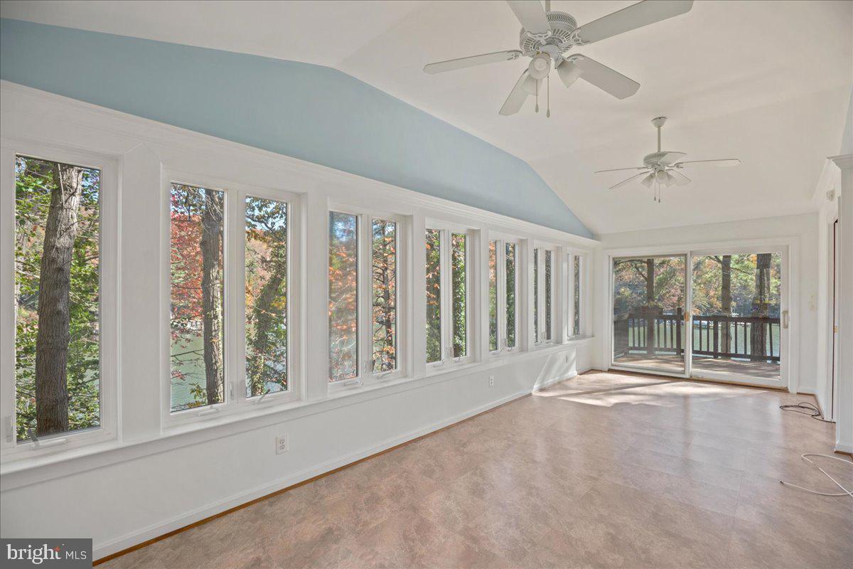 13140 Soundings Road Lusby, MD 20657 - Photo 41 of 81 Large and bright sunroom, 2 views on the point