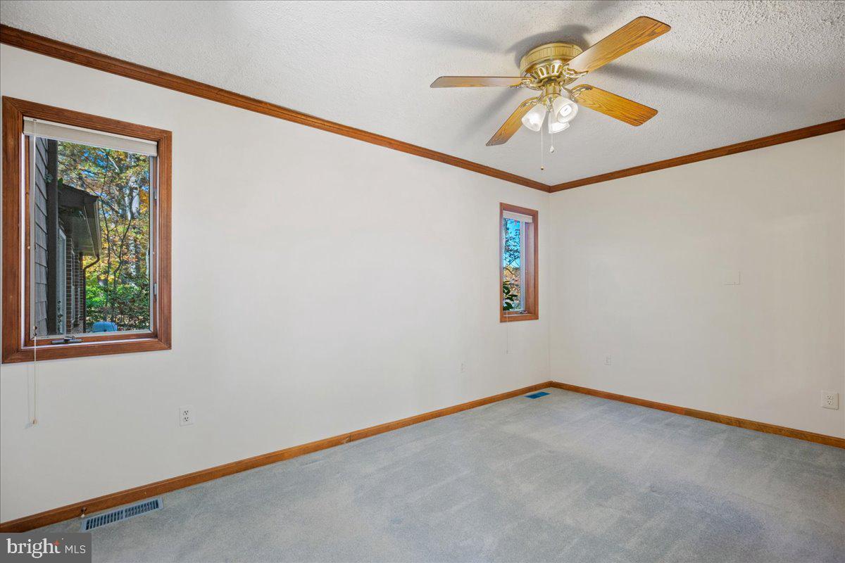 13140 Soundings Road Lusby, MD 20657 - Photo 44 of 81 a view of an empty room with a window