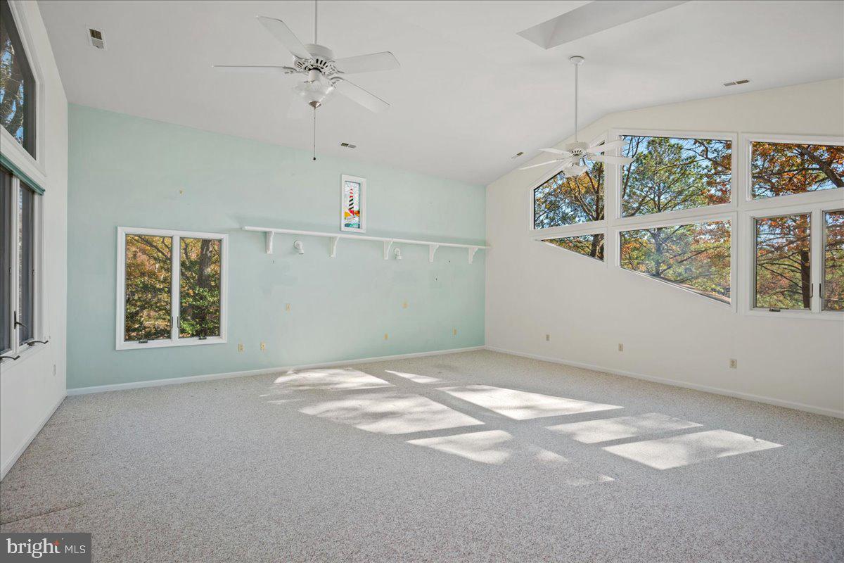 13140 Soundings Road Lusby, MD 20657 - Photo 53 of 81 a view of an empty room with a window