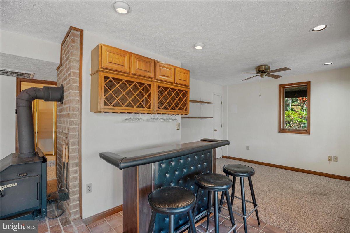 13140 Soundings Road Lusby, MD 20657 - Photo 71 of 81 a view of a dining room with furniture and a window