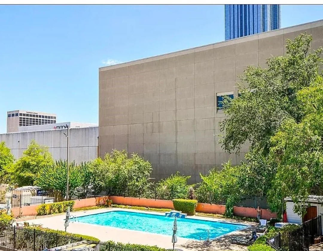 5150 Hidalgo Street, Unit 1503 Houston, TX 77056 - Photo 15 of 16 a view of outdoor space yard and swimming pool