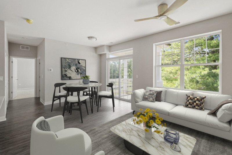 401 Haber Road, Unit 201 Cary, IL 60013 - Photo 3 of 5 a living room with furniture and a large window