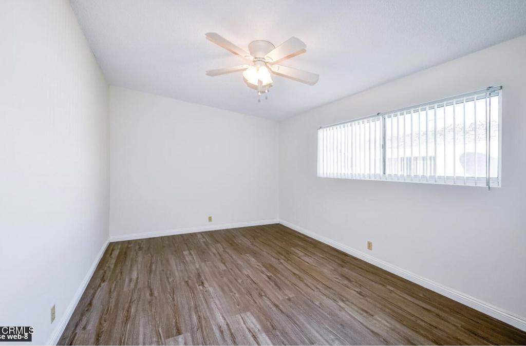 2707 Montrose Avenue, Unit 10 Montrose, CA 91020 - Photo 9 of 15 wooden floor in an empty room with a window