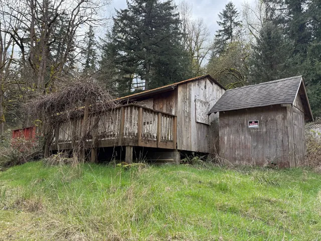 a backyard of a house with lots of green space