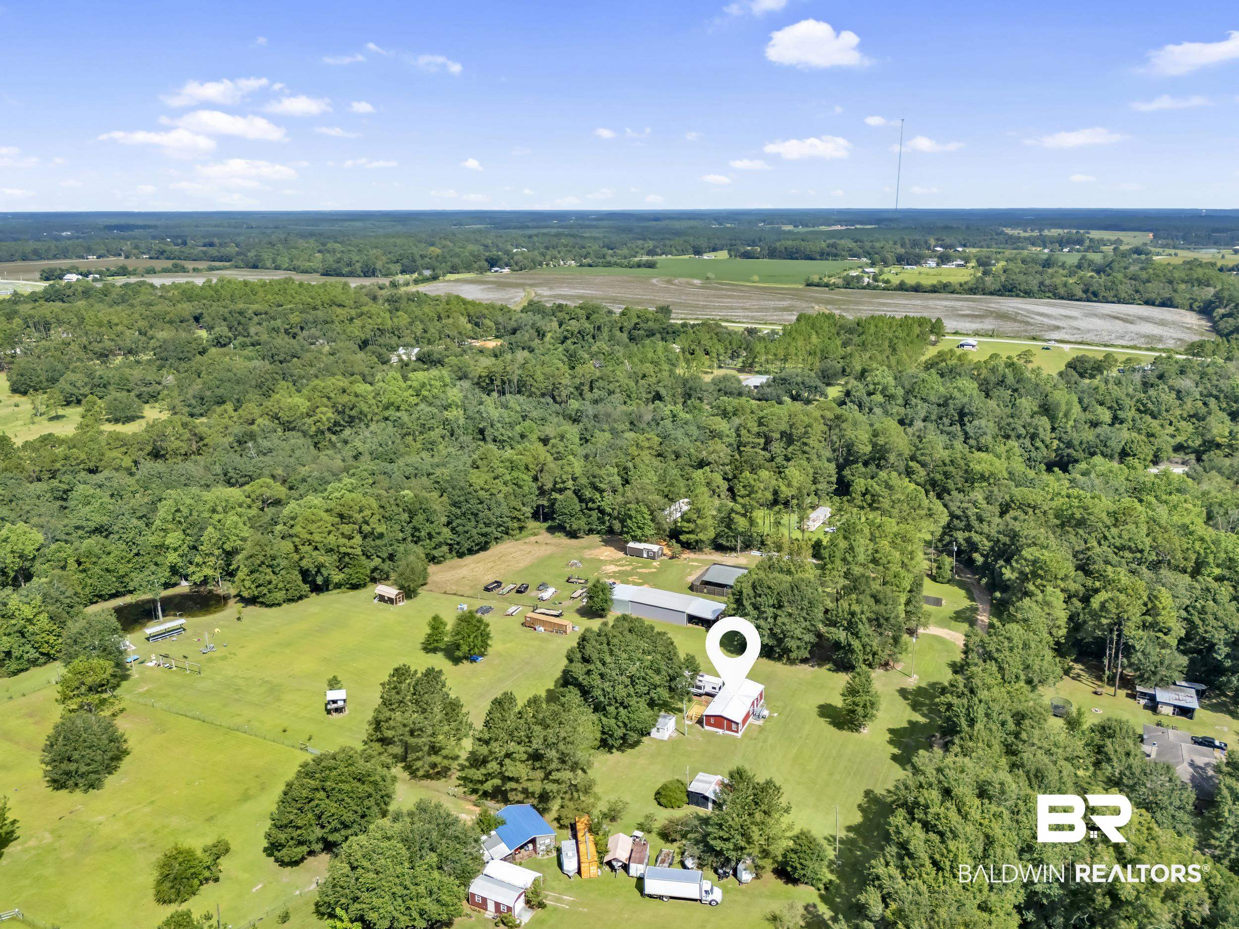 22823 Lanier Road Robertsdale, AL 36567 - Photo 14 of 46 Bird's eye view of a heavily wooded area
