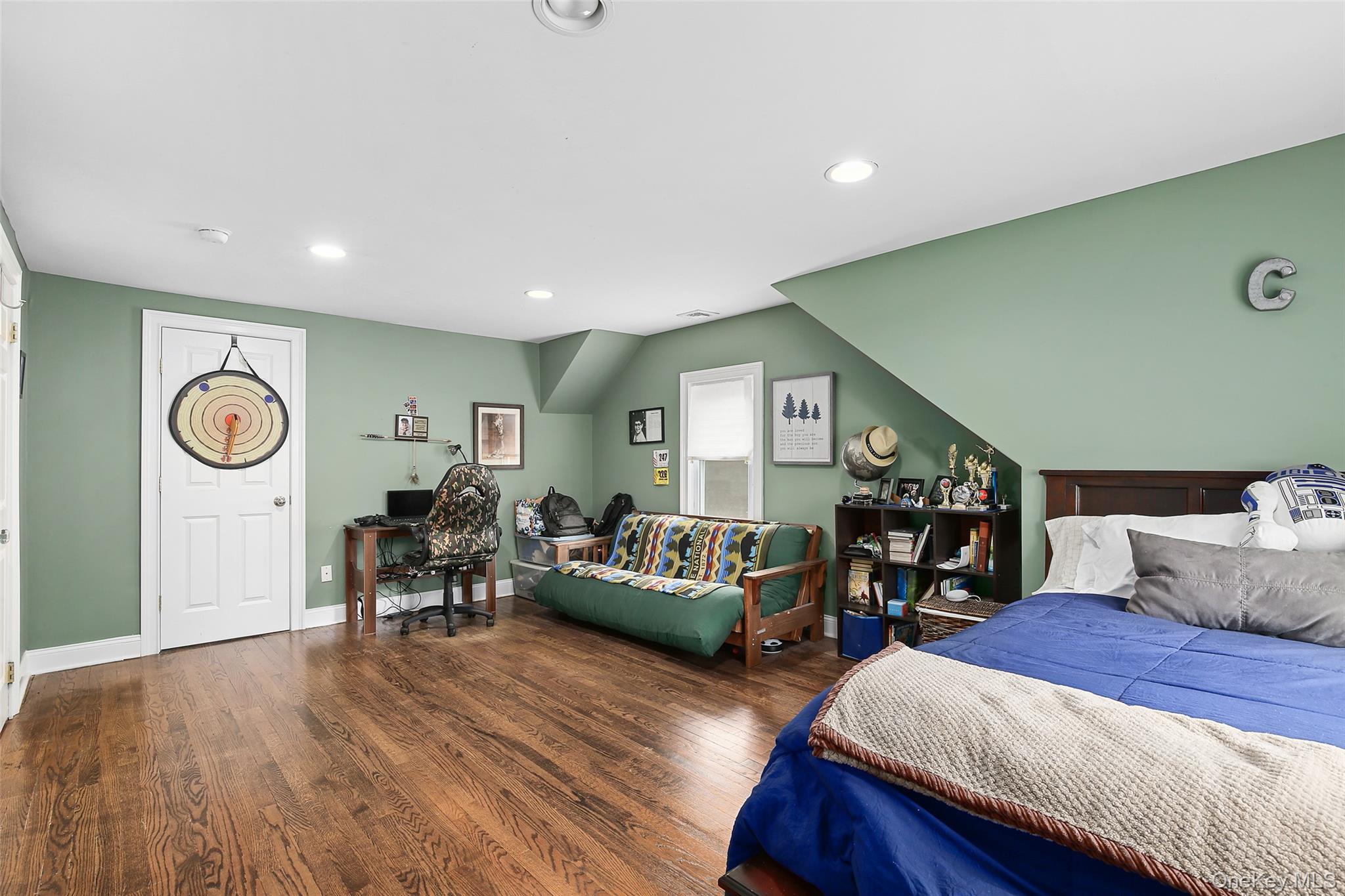 8 Goldwin Street Rye, NY 10580 - Photo 12 of 25 a living room with furniture and a wooden floor