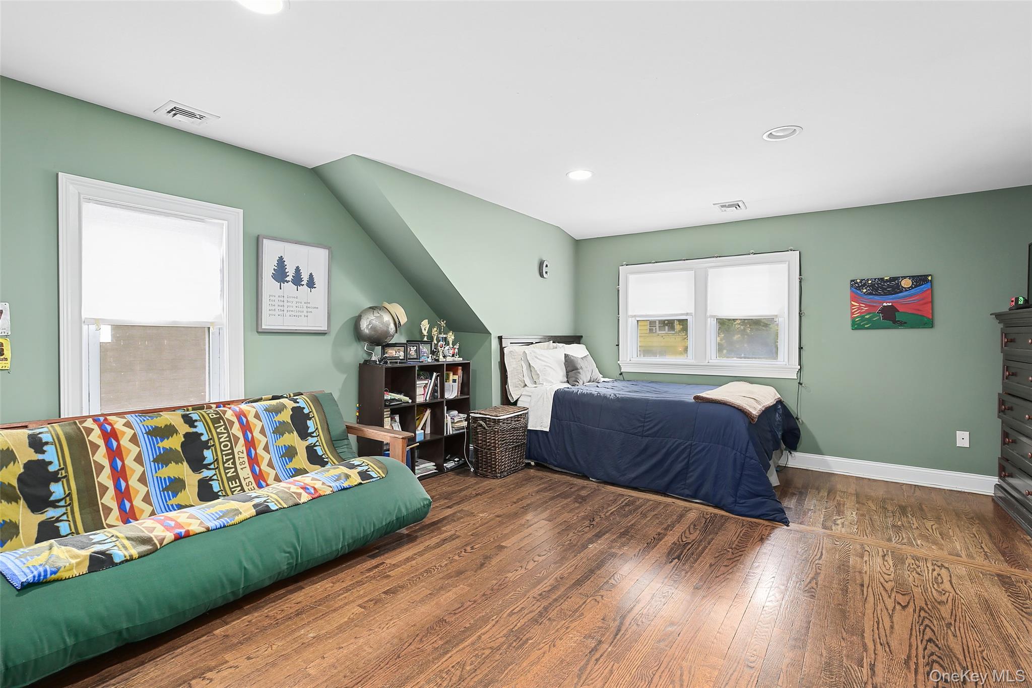 8 Goldwin Street Rye, NY 10580 - Photo 13 of 25 a bedroom with furniture and a large window