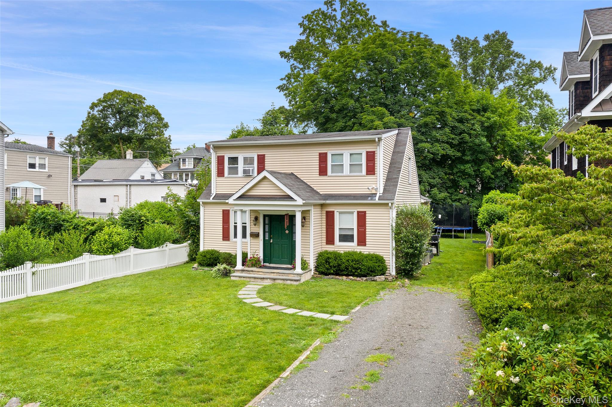 8 Goldwin Street Rye, NY 10580 - Photo 23 of 25 a front view of a house with a yard
