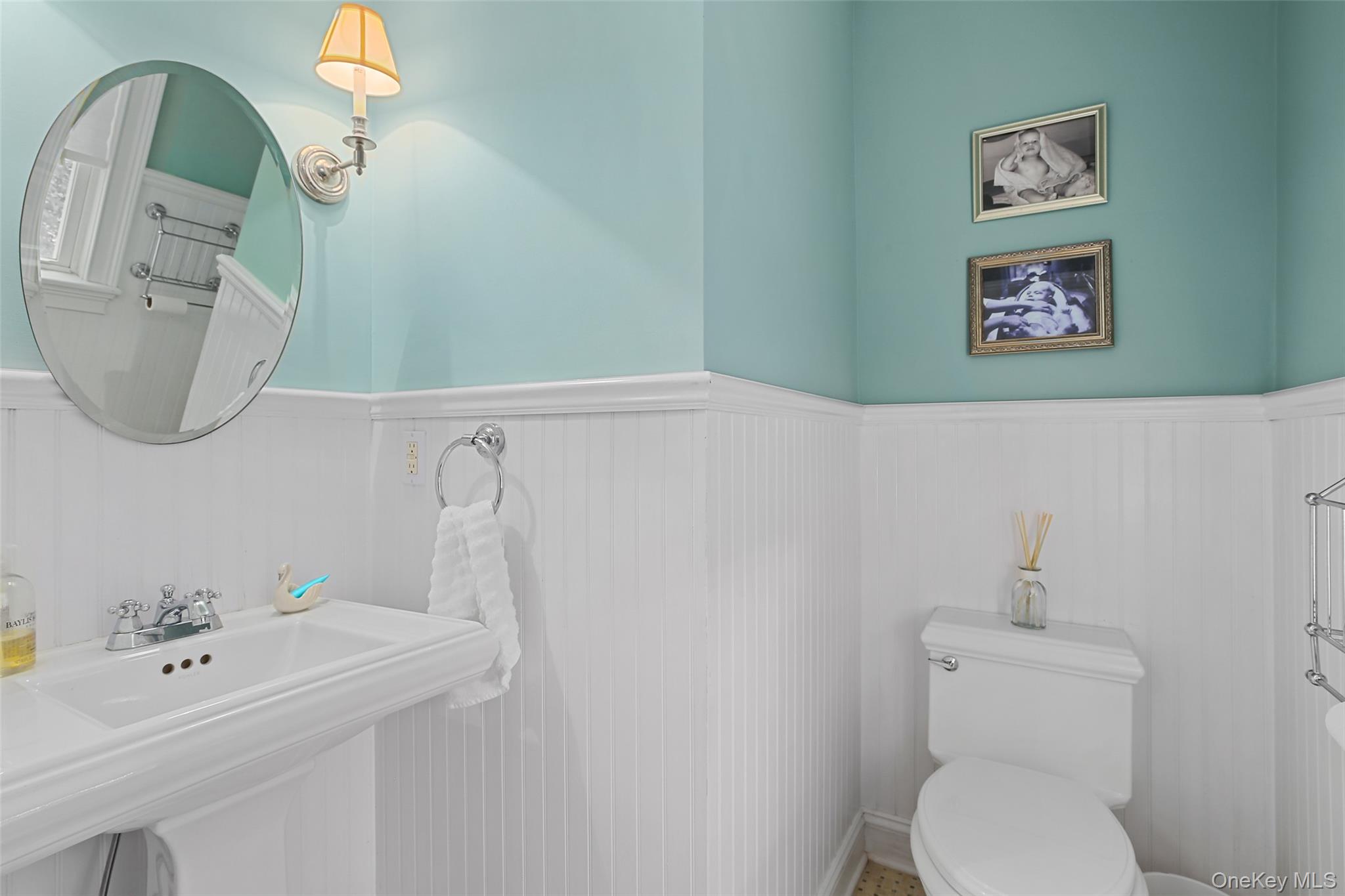 8 Goldwin Street Rye, NY 10580 - Photo 9 of 25 a bathroom with a toilet a sink and mirror