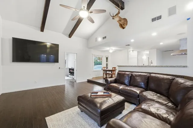 a view of a livingroom with a flat screen tv