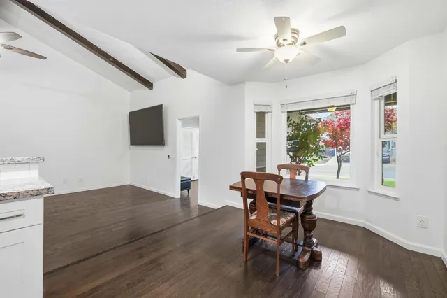 a white toilet sitting next to a bathroom sink