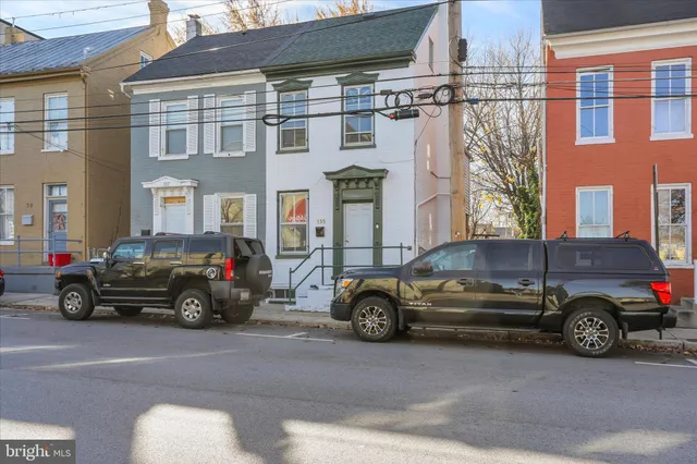 a car parked in front of a building