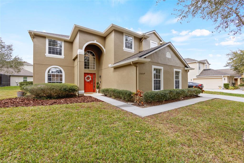 a front view of house with yard