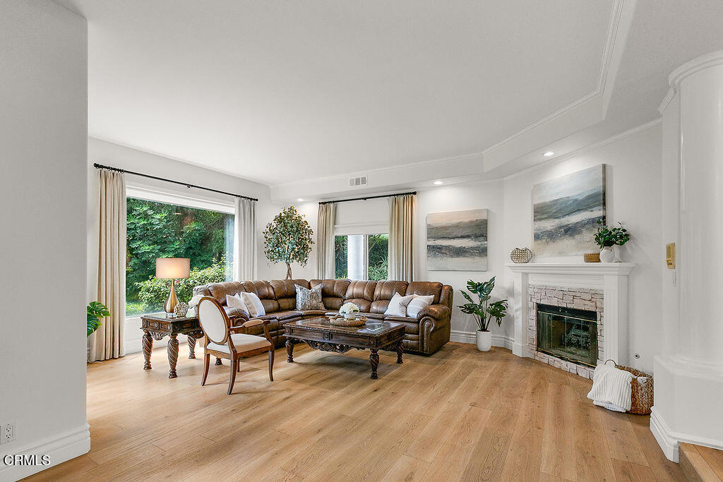 11016 Red Barn Road Camarillo, CA 93012 - Photo 12 of 72 a living room with furniture and a fireplace