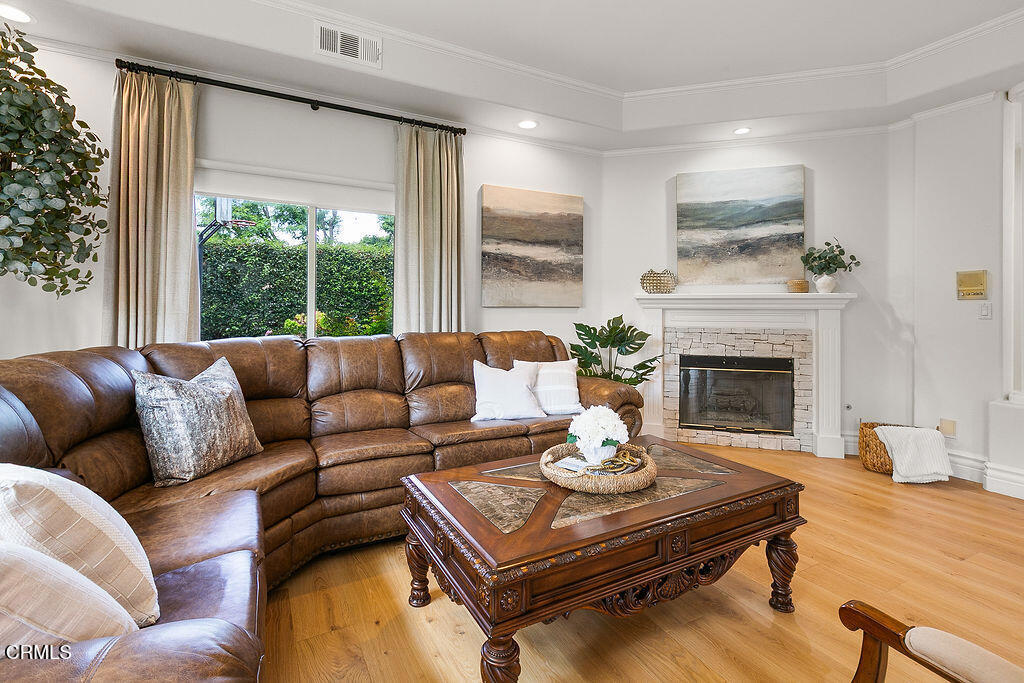 11016 Red Barn Road Camarillo, CA 93012 - Photo 13 of 72 a living room with furniture a fireplace and a large window