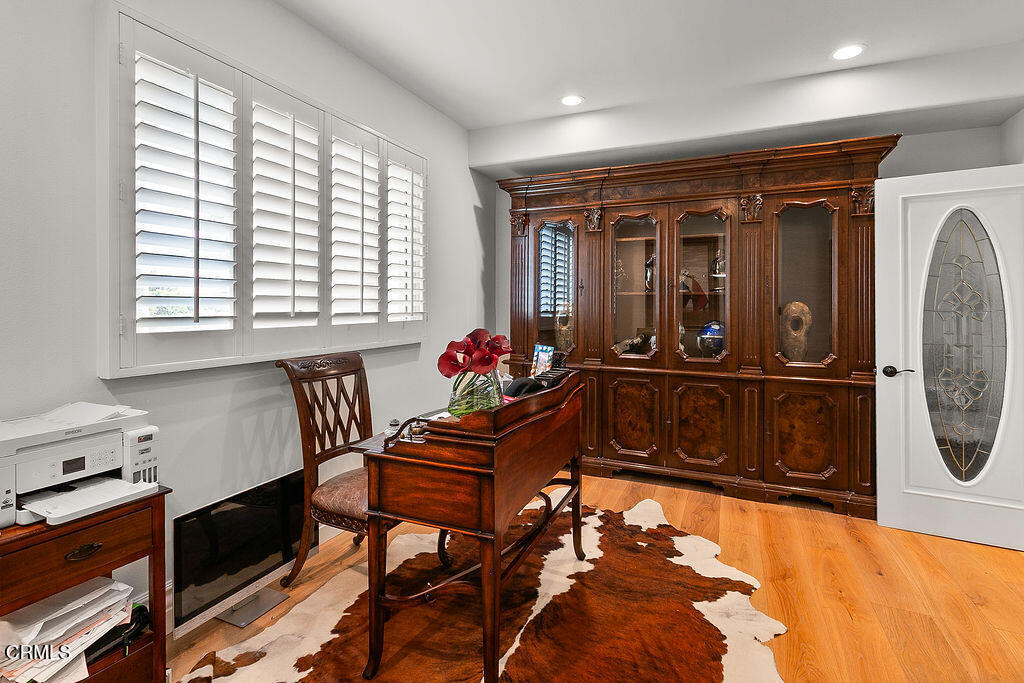11016 Red Barn Road Camarillo, CA 93012 - Photo 16 of 72 a living room with furniture fireplace and flat screen tv