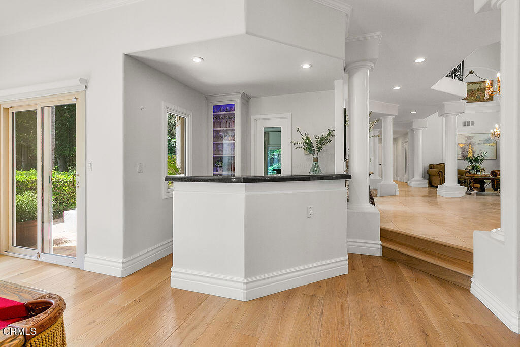 11016 Red Barn Road Camarillo, CA 93012 - Photo 17 of 72 a view of a kitchen with kitchen island stainless steel appliances wooden floor and window