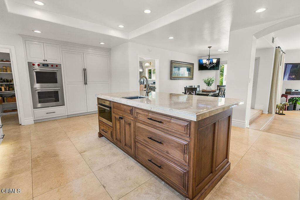 11016 Red Barn Road Camarillo, CA 93012 - Photo 24 of 72 a kitchen with stainless steel appliances granite countertop a stove and a sink