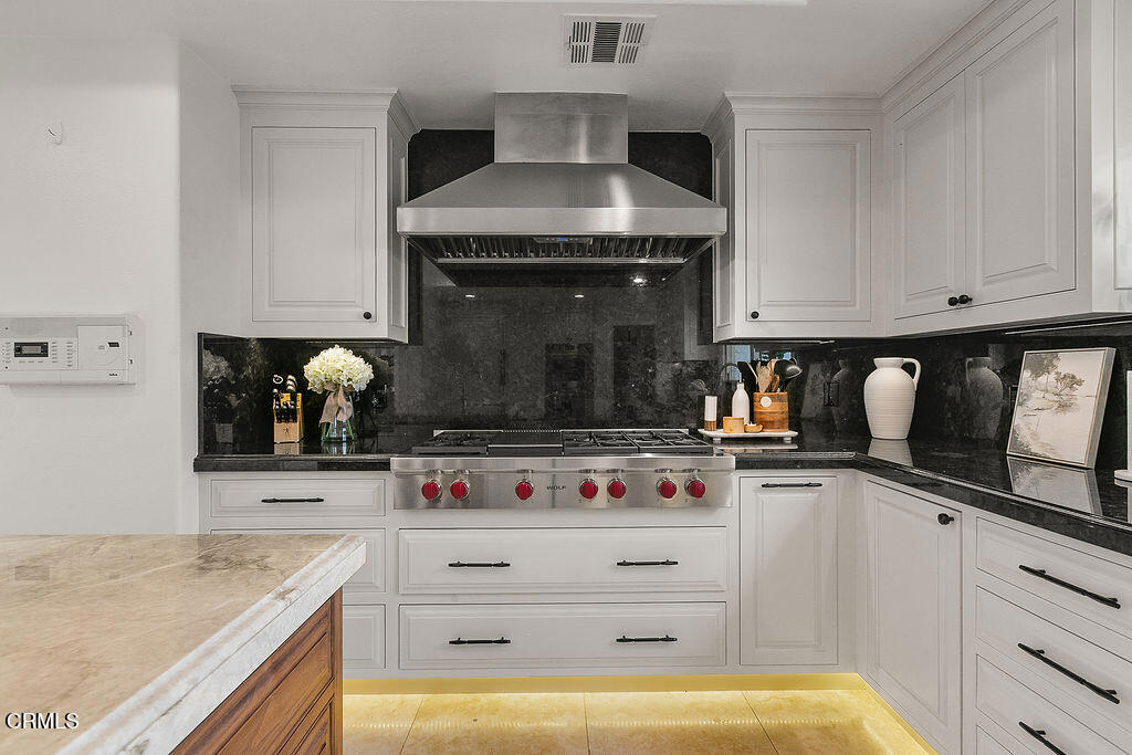 11016 Red Barn Road Camarillo, CA 93012 - Photo 27 of 72 a kitchen with granite countertop a sink and cabinets
