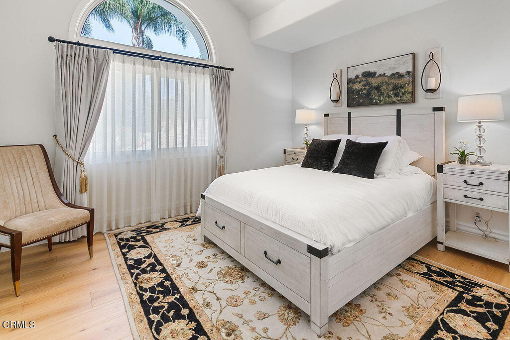 11016 Red Barn Road Camarillo, CA 93012 - Photo 47 of 72 a bedroom with a bed and a dresser next to a window