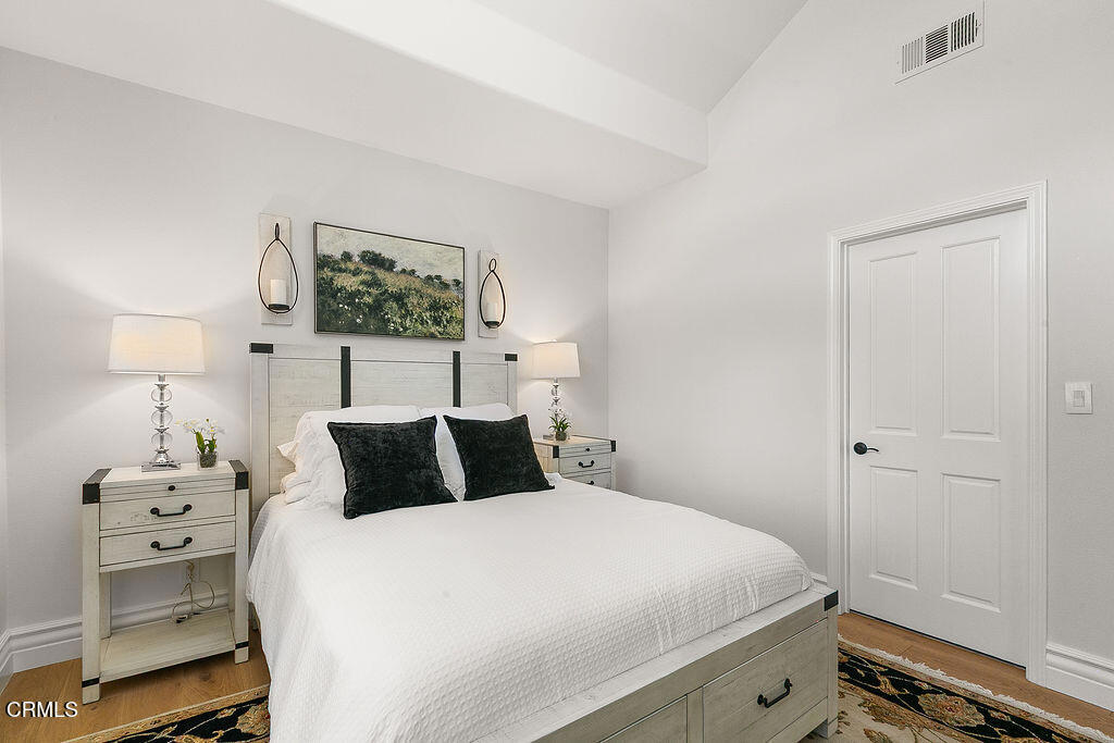 11016 Red Barn Road Camarillo, CA 93012 - Photo 48 of 72 a bedroom with a bed and a night stand