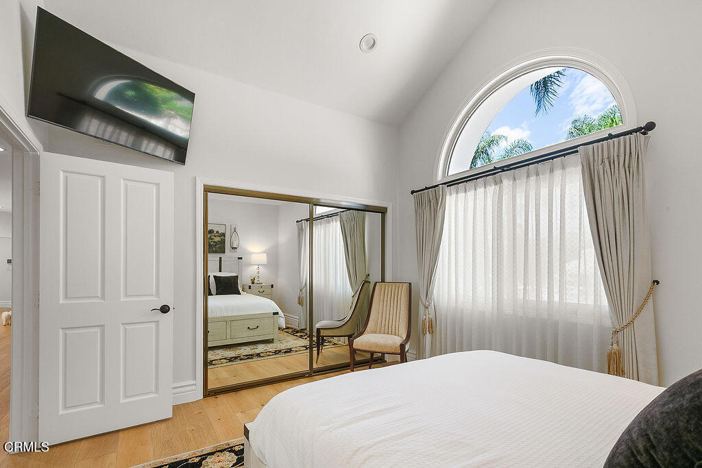 11016 Red Barn Road Camarillo, CA 93012 - Photo 49 of 72 a bedroom with a bed tv and a window