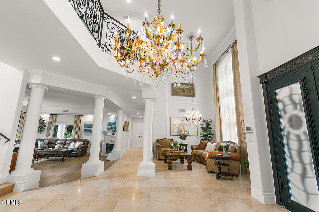 11016 Red Barn Road Camarillo, CA 93012 - Photo 9 of 72 a living room with furniture and a chandelier