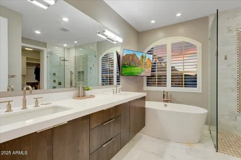 a bathroom with a shower and a bathroom