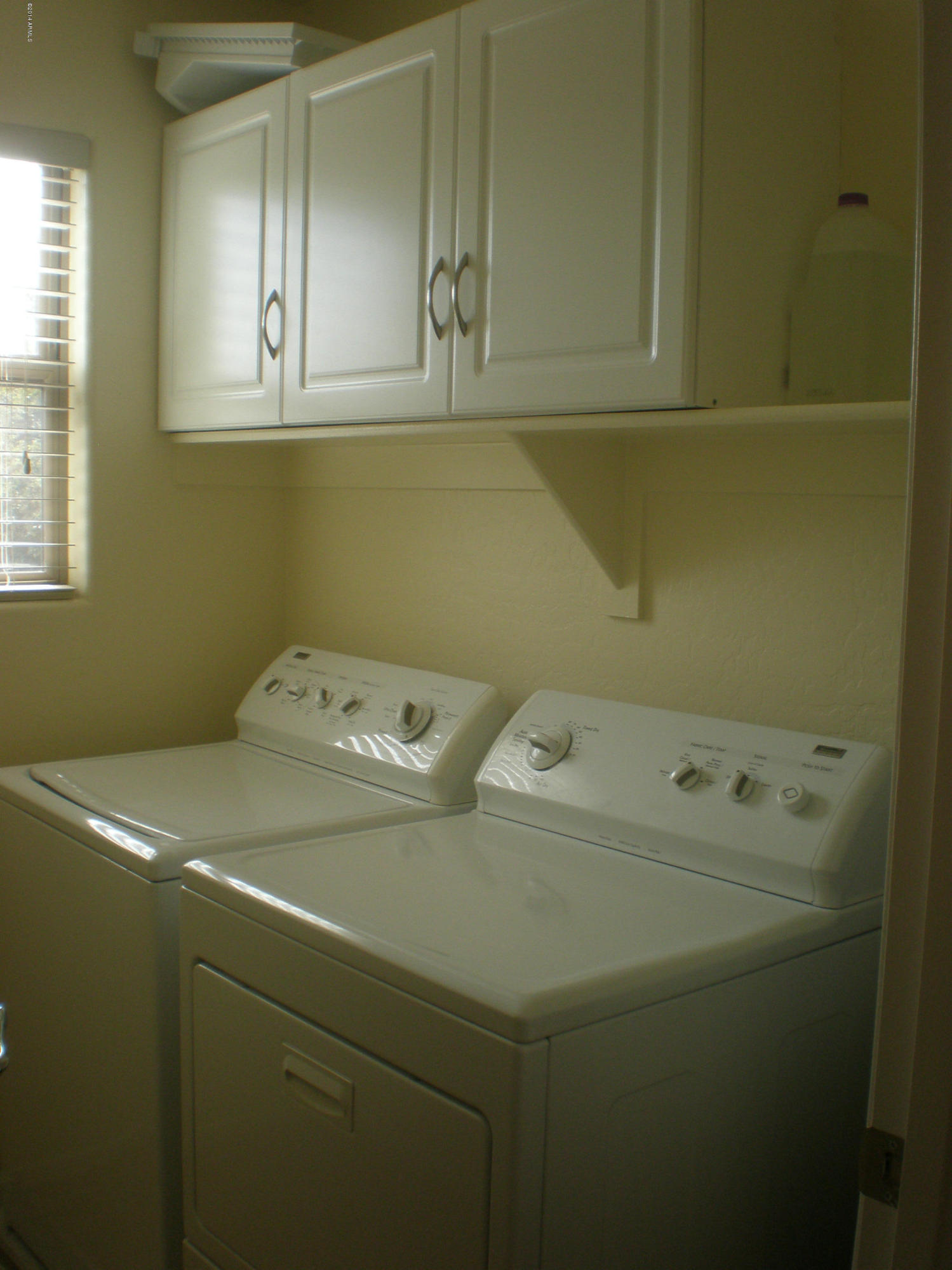4576 East Del Rio Street Gilbert, AZ 85295 - Photo 19 of 23 Upstairs Laundry with Storage