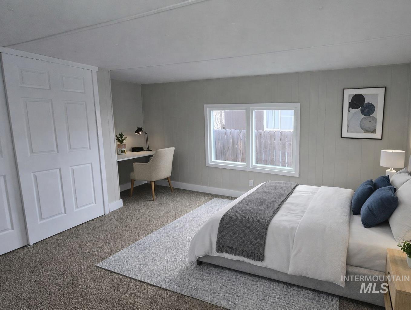 5015 East Ustick Road, Unit 172 Caldwell, ID 83605 - Photo 17 of 21 Bedroom featuring built in desk and carpet floors