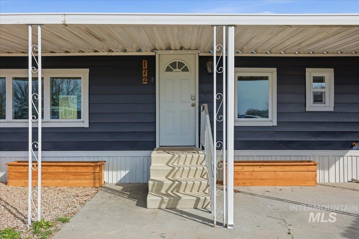 5015 East Ustick Road, Unit 172 Caldwell, ID 83605 - Photo 3 of 21 View of exterior entry featuring covered porch