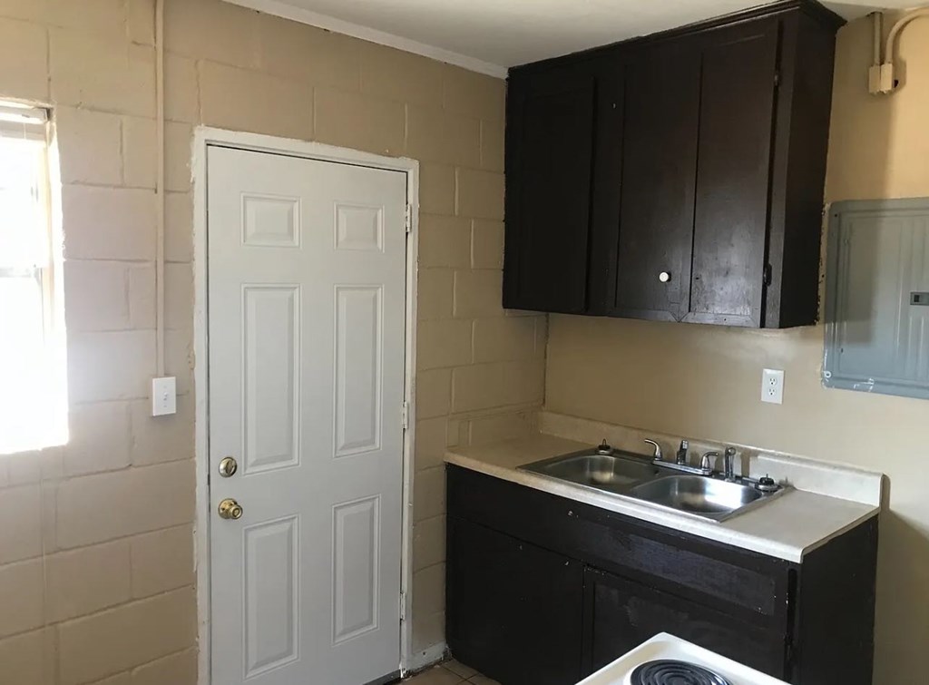 3403 Terminal Court Columbus, GA 31906 - Photo 5 of 8 a kitchen with a sink and cabinets