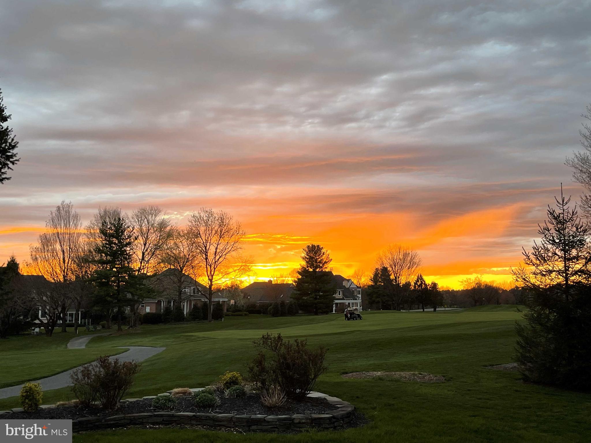 810 Woodfield Drive Lititz, PA 17543 - Photo 40 of 49 a view of a golf course with a lake
