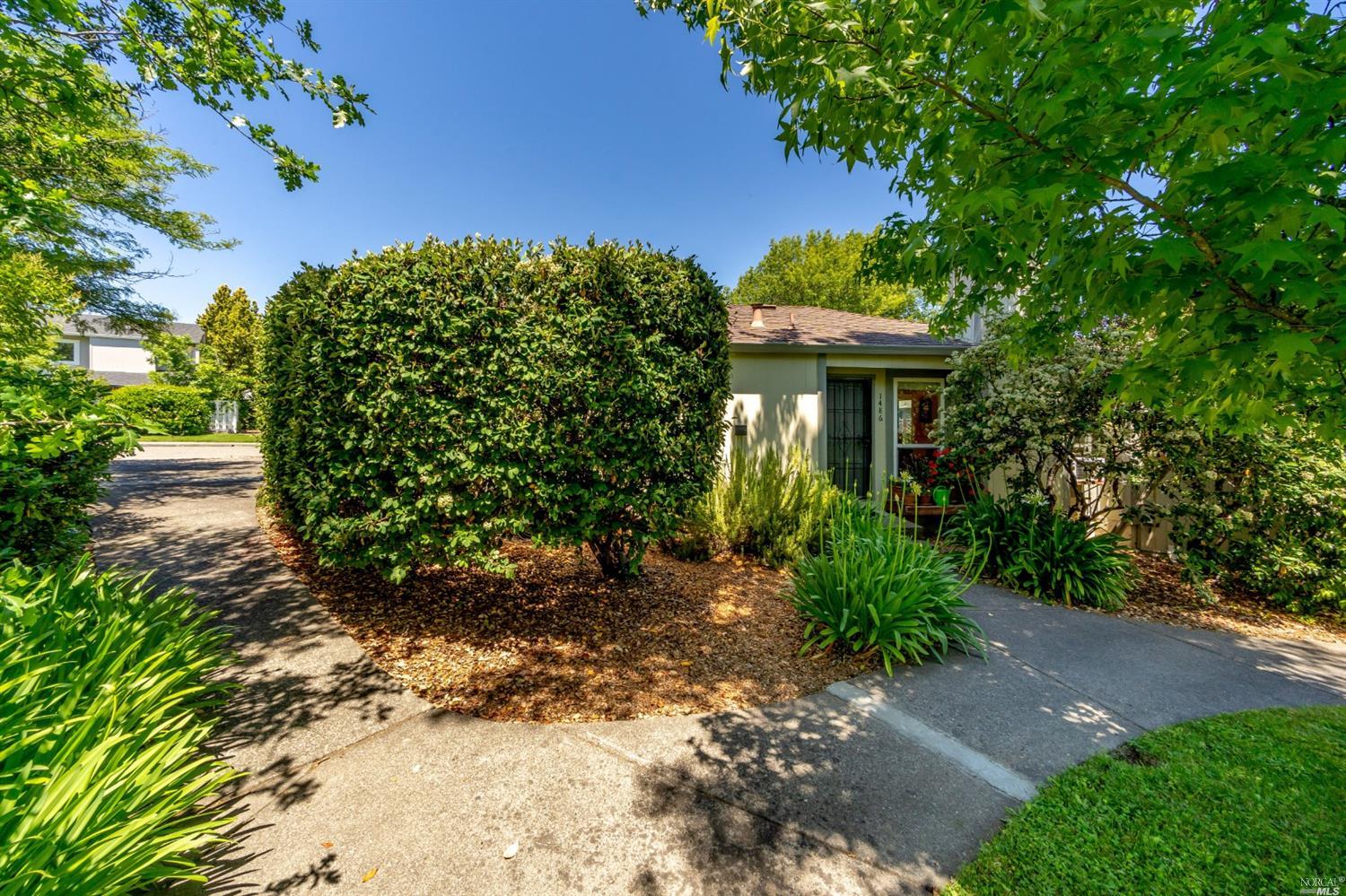 1486-1488 Post Ranch Road Santa Rosa, CA 95405 - Photo 1 of 1 Off the quiet street you'll find the entrances to the homes, facing a circular courtyard which allows for privacy and a serene entrance to both units.