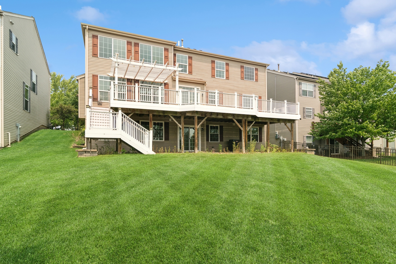 308 Emerald Drive Streamwood, IL 60107 - Photo 23 of 30 front view of a house with a yard