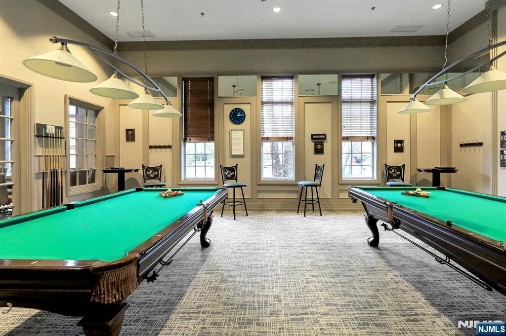 6 Cliff Road, Unit D2 Woodland Park, NJ 07424 - Photo 32 of 40 a room with pool table and windows