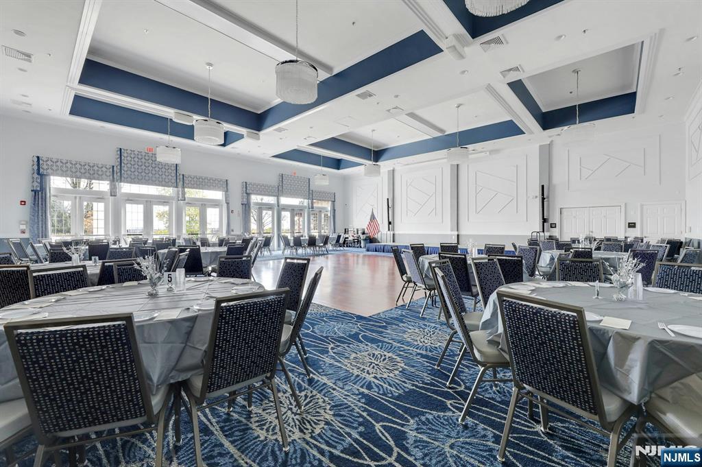 6 Cliff Road, Unit D2 Woodland Park, NJ 07424 - Photo 37 of 40 a view of a dining room with furniture