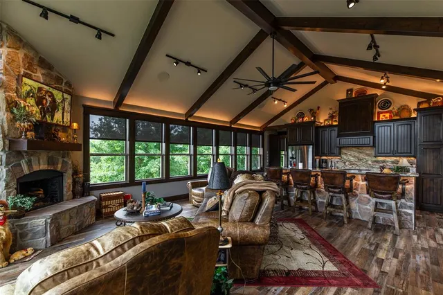 a view of a livingroom with furniture window and outside view