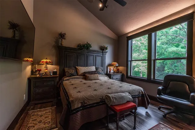 a bed room with furniture and a window