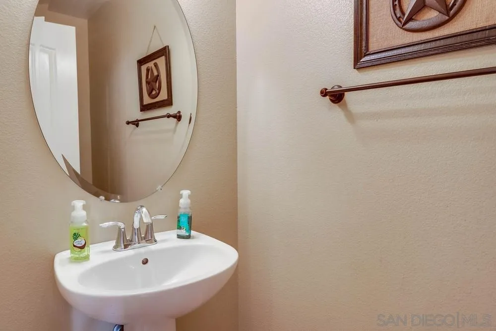 10005 Day Creek Trail Santee, CA 92071 - Photo 24 of 45 a bathroom with a sink and a mirror