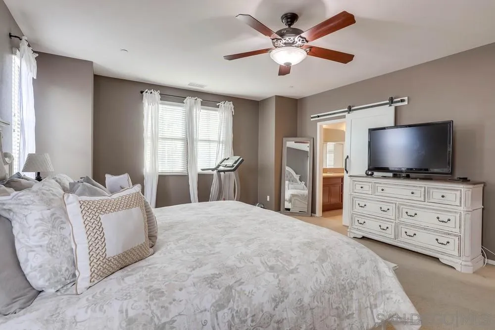 10005 Day Creek Trail Santee, CA 92071 - Photo 27 of 45 a bedroom with furniture and a flat screen tv