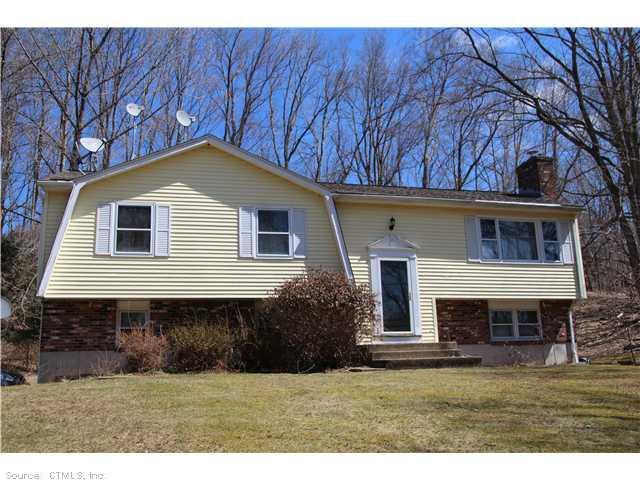 43 Millstream Road Hebron, CT 06231 - Photo 1 of 1 a front view of house with yard