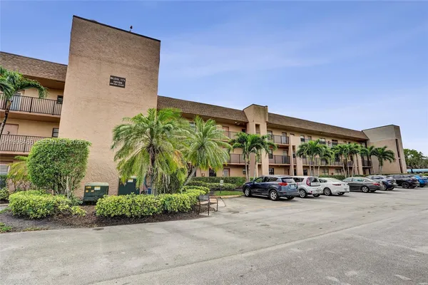 a building with trees in front of it