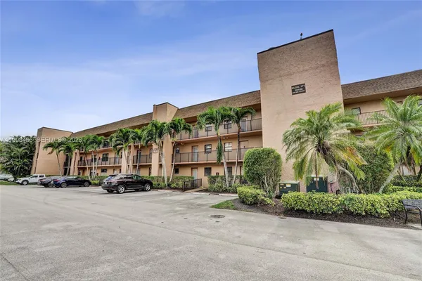 a view of car parked in front of house