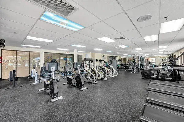 a kitchen with a stove and a table