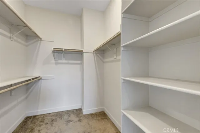 a view of storage and utility room with empty racks