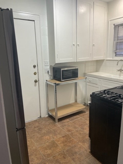 1609 Kipling Street Houston, TX 77006 - Photo 11 of 22 Backdoor in Kitchen